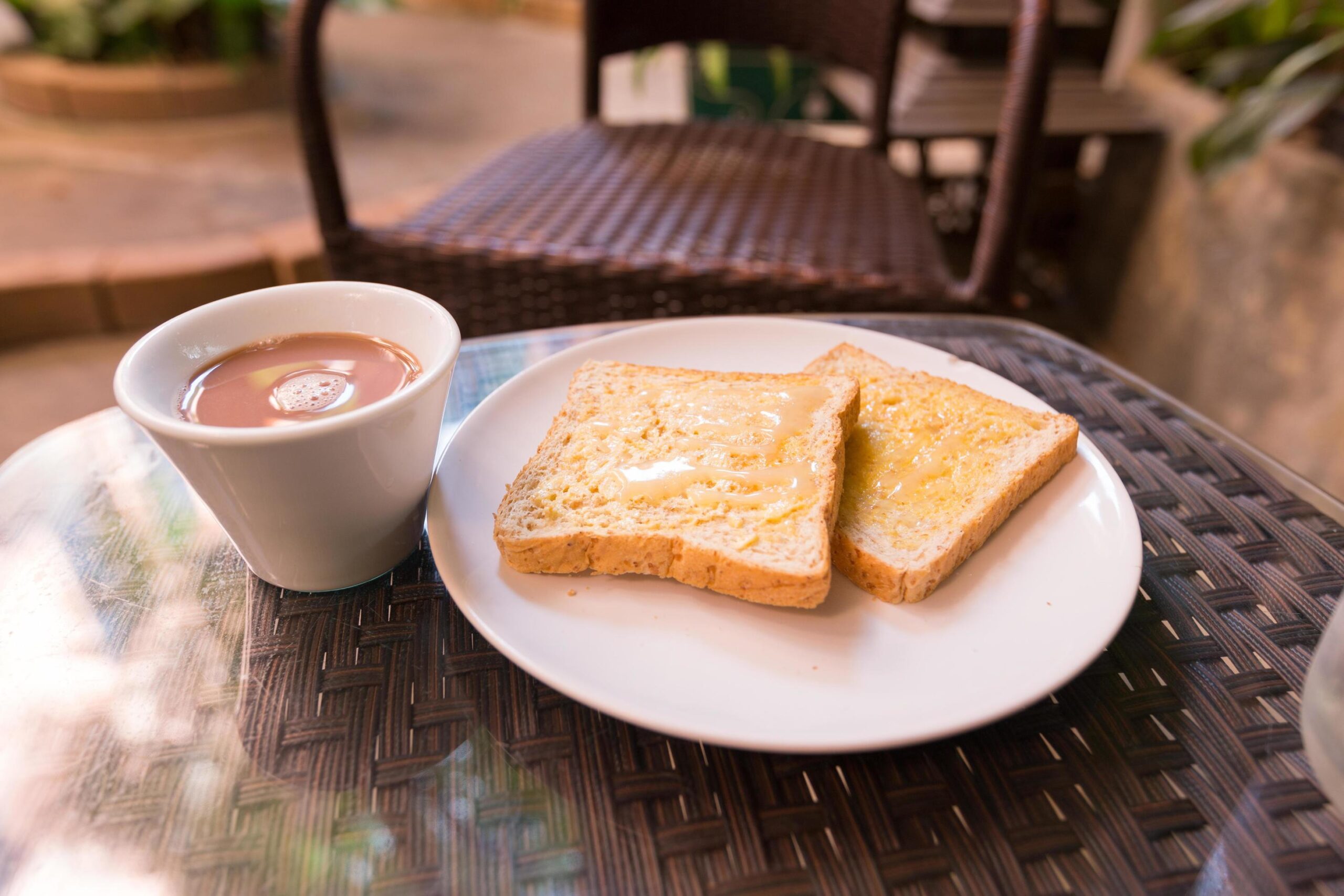 toast-and-coffee-on-the-table-free-photo